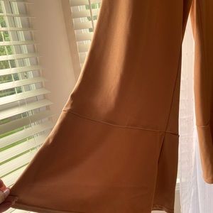 By Eric. Polyester and spandex. Wide leg palazzos. Extra Large. Dressy or casual